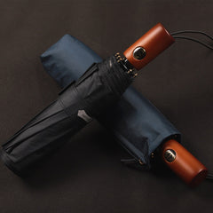 Automatic ten-bone umbrella solid wood handle.