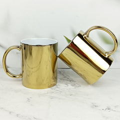 Gold plated ceramic mug
