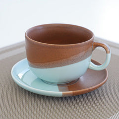 Vintage ceramic coffee cup and saucer set